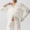 Camisa de manga larga con botones «Golden Hour», semitransparente — Marfil