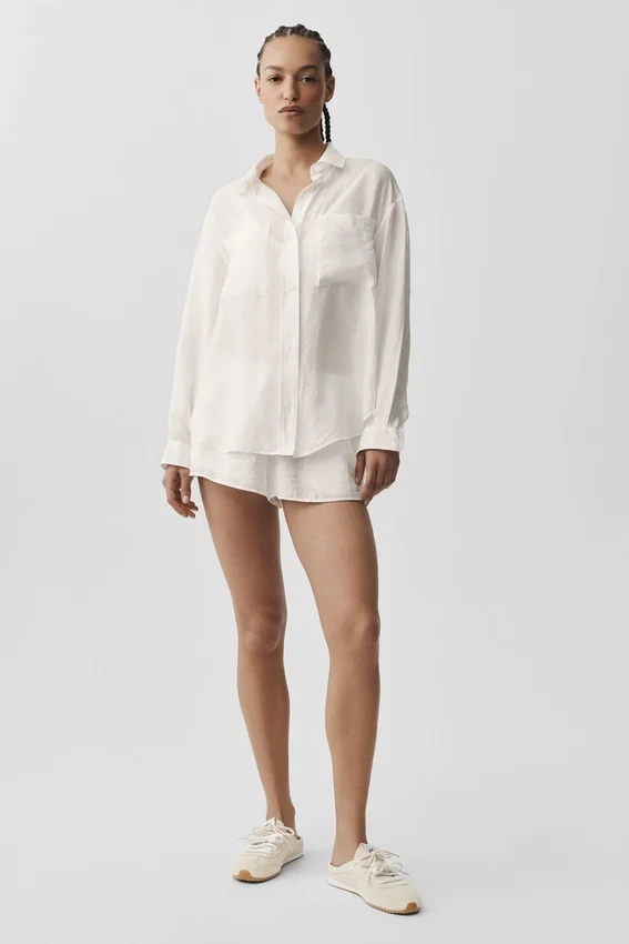 Camisa de manga larga con botones «Golden Hour», semitransparente — Marfil