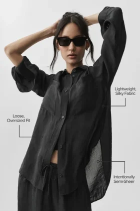 Camisa de manga larga con botones «Golden Hour» semitransparente — Negro