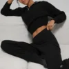 Jerséu de cachemira con tejido tipo waffle y cremallera de 1/4 - Negro