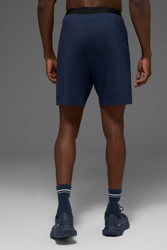 Pantalón corto Conquer React Performance de 7" - Azul marino