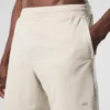 Pantalón corto Conquer React Performance de 7" - Color hueso