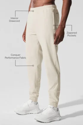 Pantalón de chándal Conquer Max Performance – Beige
