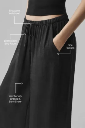 Pantalón High-Waist y pierna recta «Golden Hour» semitransparente – Negro