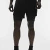 Pantalones cortos de alto rendimiento Conquer React 2 en 1 - Negro/Negro