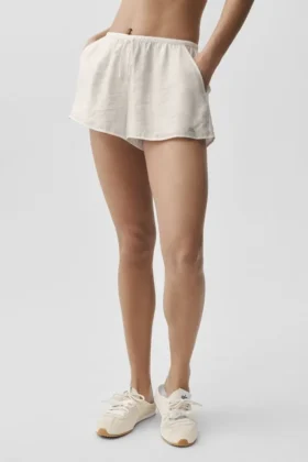 Pantalones cortos de talle medio Golden Hour semitransparentes - Marfil
