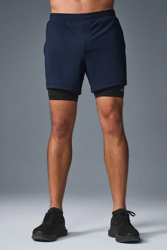 Pantalones cortos deportivos Conquer React 2 en 1 - Azul marino/Negro