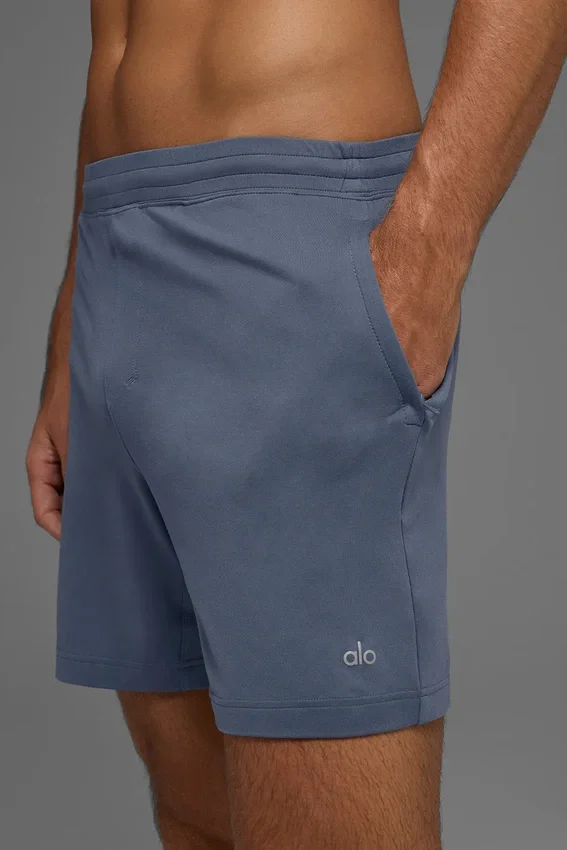 Pantalones cortos deportivos Conquer React de 7" - Piedra azul