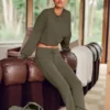 Pantalones de chándal Sway de corte acampanado - Olivo