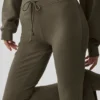 Pantalones de chándal Sway de corte acampanado - Olivo