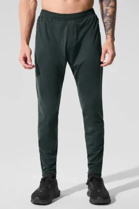 Pantalones deportivos Conquer React — Verde carbón