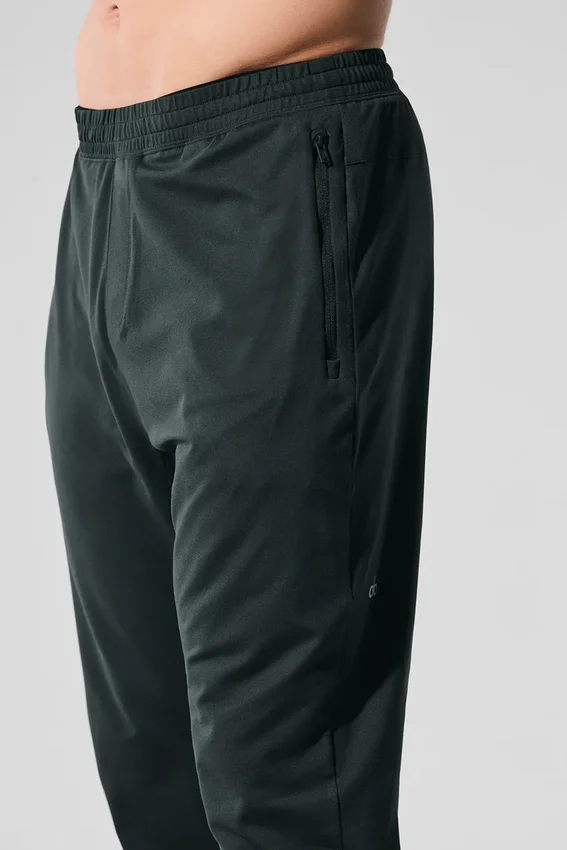Pantalones deportivos Conquer React — Verde carbón