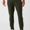 Pantalones deportivos Conquer React - Verde sigiloso