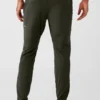 Pantalones deportivos Conquer React - Verde sigiloso