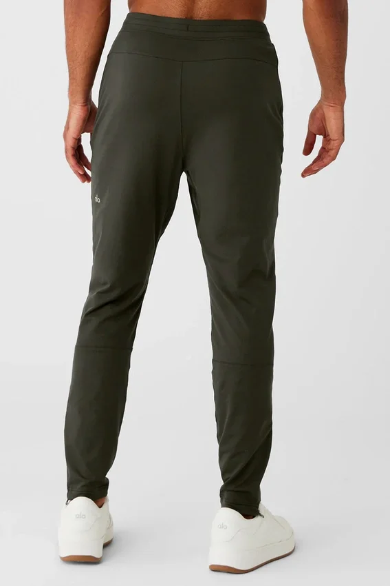 Pantalones deportivos Conquer React - Verde sigiloso