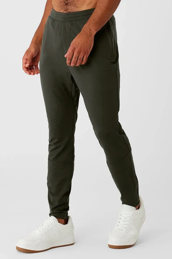 Pantalones deportivos Conquer React - Verde sigiloso