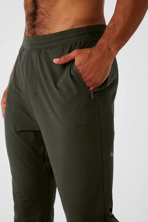 Pantalones deportivos Conquer React - Verde sigiloso