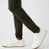 Pantalones deportivos Conquer React - Verde sigiloso