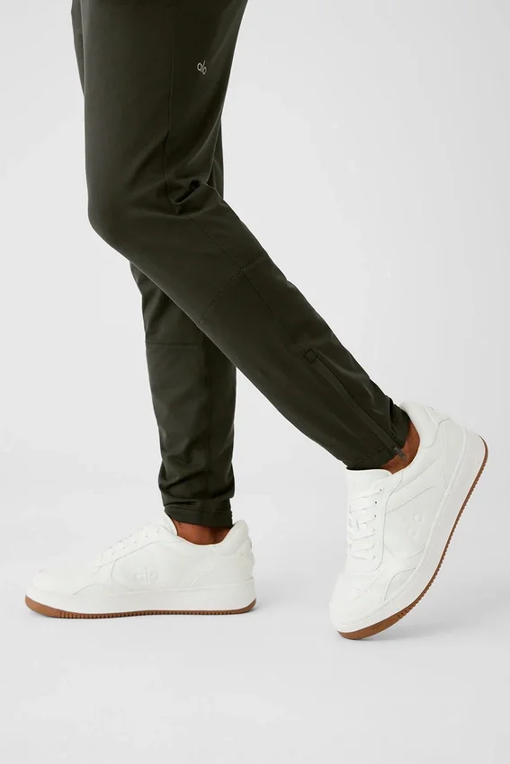 Pantalones deportivos Conquer React - Verde sigiloso