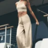 Pantalones Radiance High-Waist en mezcla de seda - Beige arena