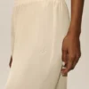 Pantalones Radiance High-Waist en mezcla de seda - Beige arena