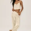 Pantalones Radiance High-Waist en mezcla de seda - Beige arena