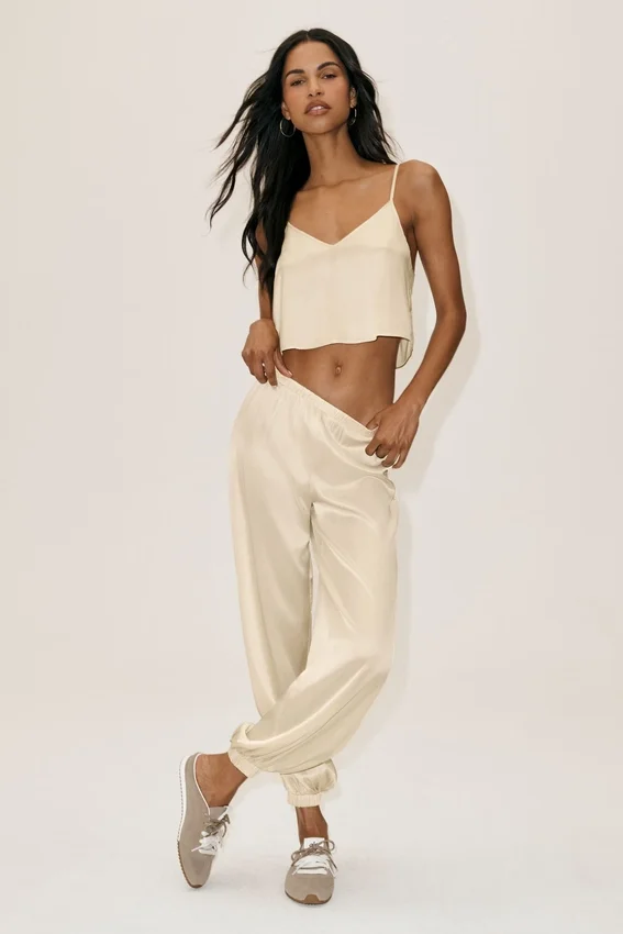 Pantalones Radiance High-Waist en mezcla de seda - Beige arena