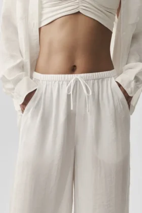 Pantalones rectos High-Waist «Golden Hour» semitransparentes – Marfil