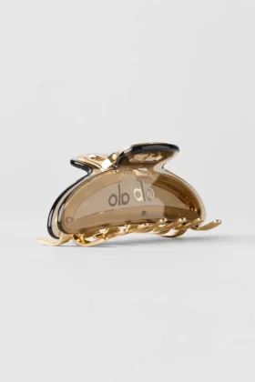 Pinza de garra de acrílico con efecto ilusión - Grava/oro cepillado